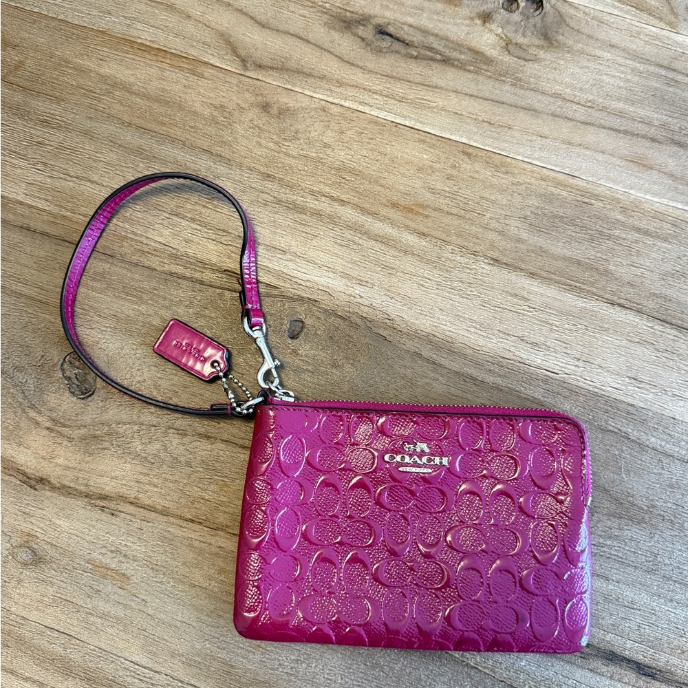 Coach Fuchsia Embossed Wristlet